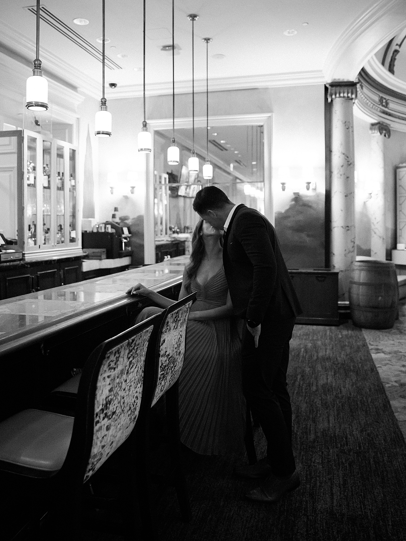 Couple kissing at the fairmont during their San Francisco engagement session | Photo by Diane Sotero