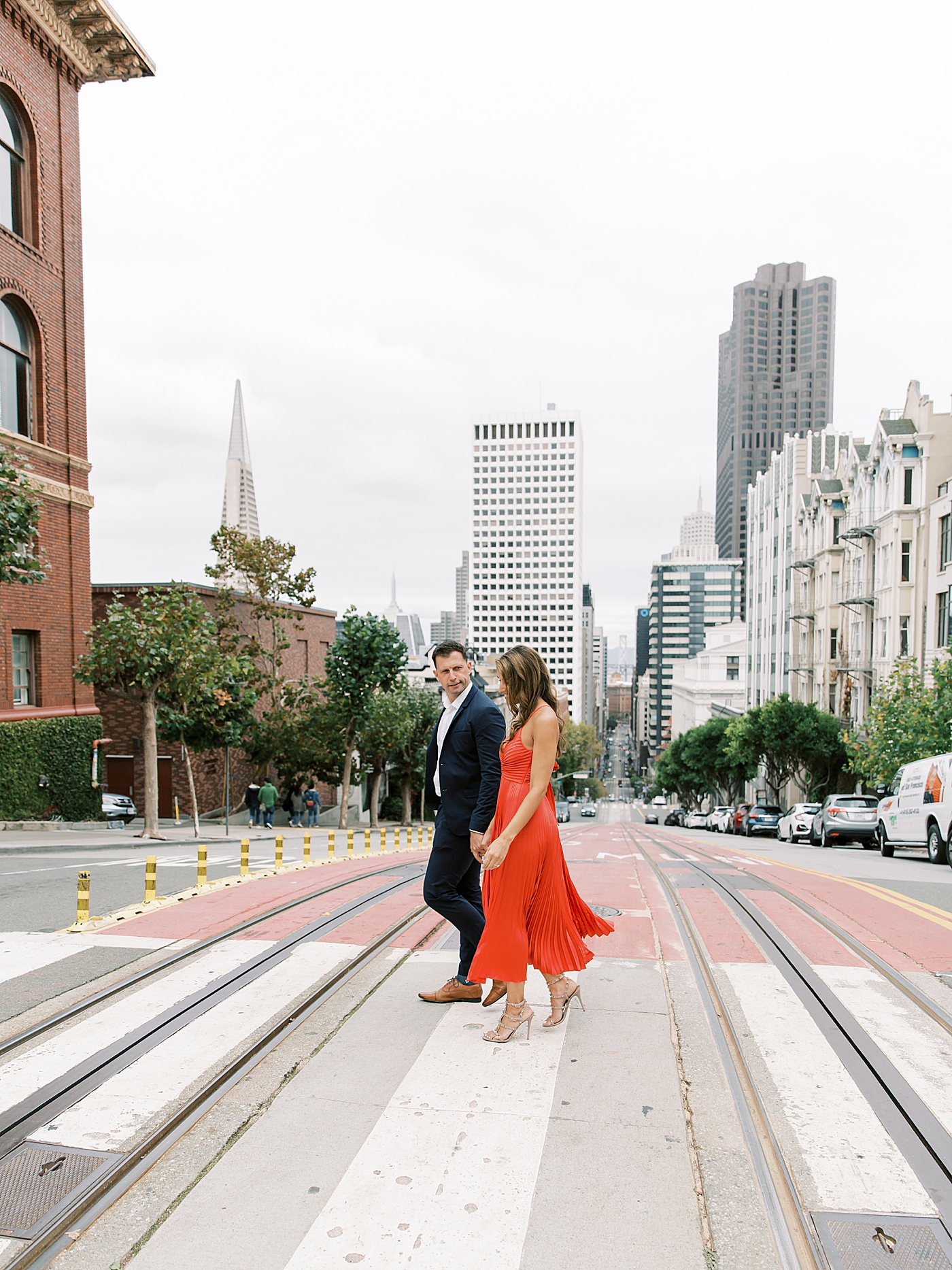 Couple in red and black during their San Francisco engagement session | Photo by Diane Sotero