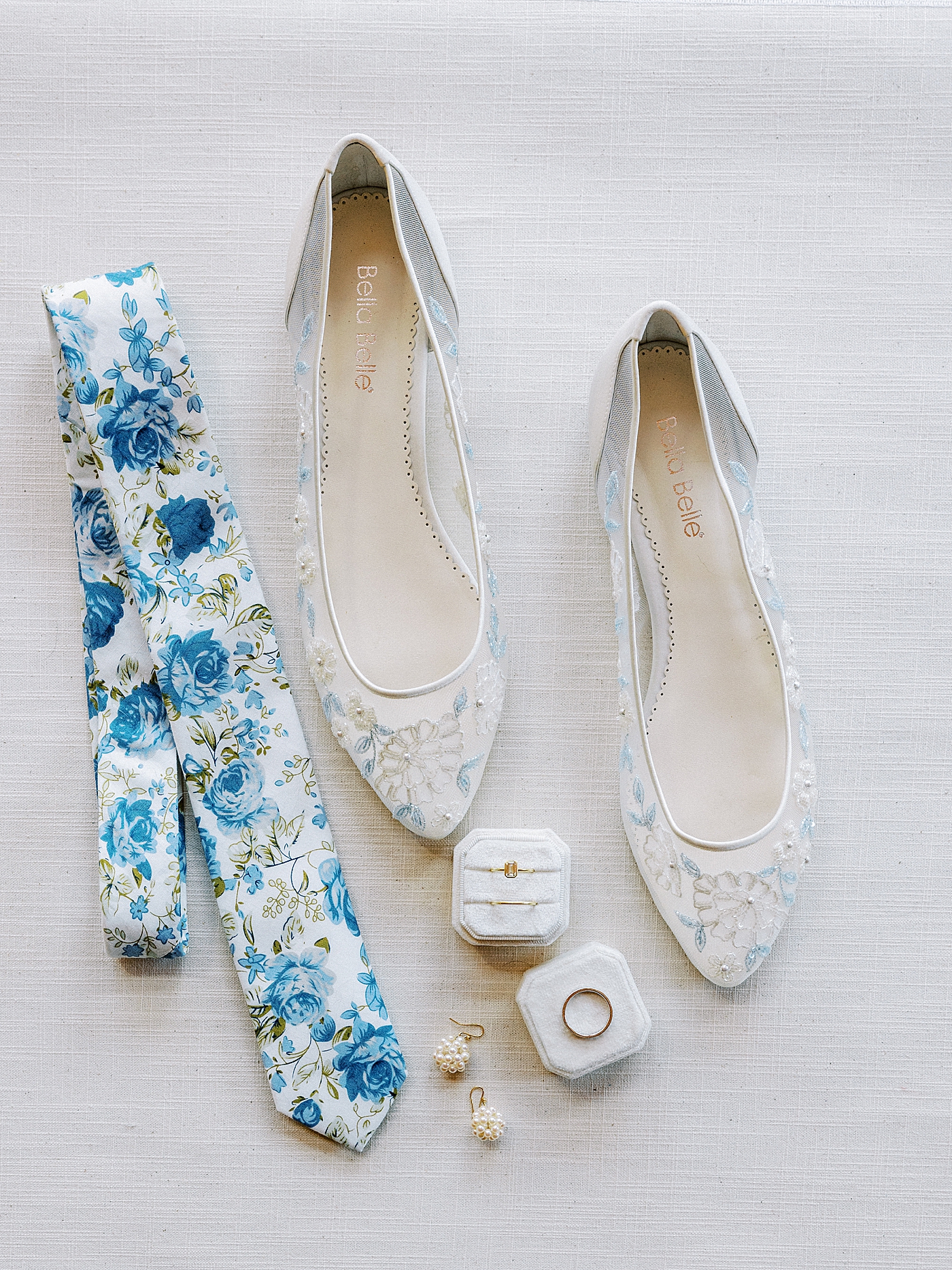 Bride and grooms wedding details styled together | Photo by Diane Sotero Photography