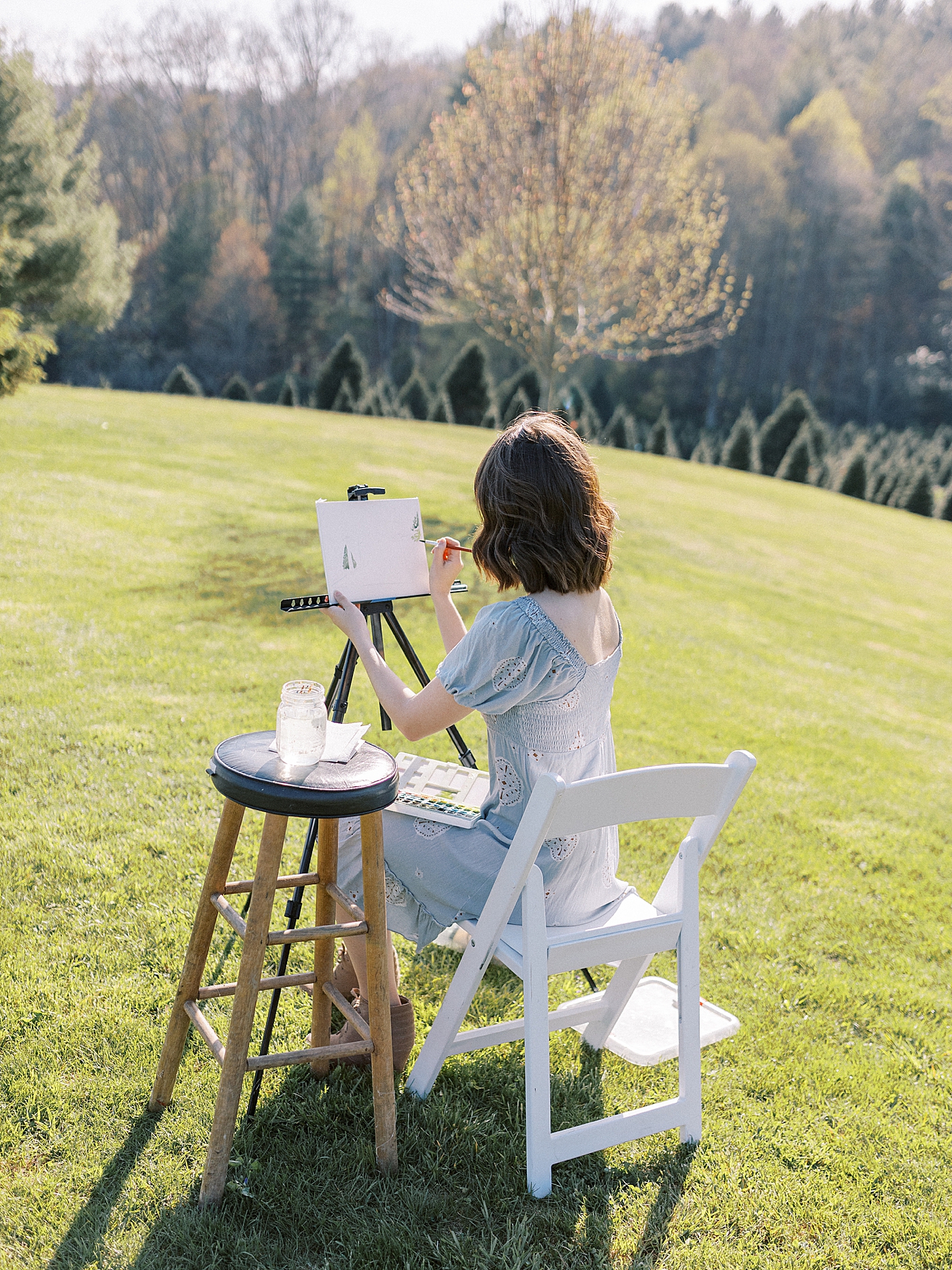 Watercolor artist painting a wedding ceremony | Photo by Diane Sotero Photography