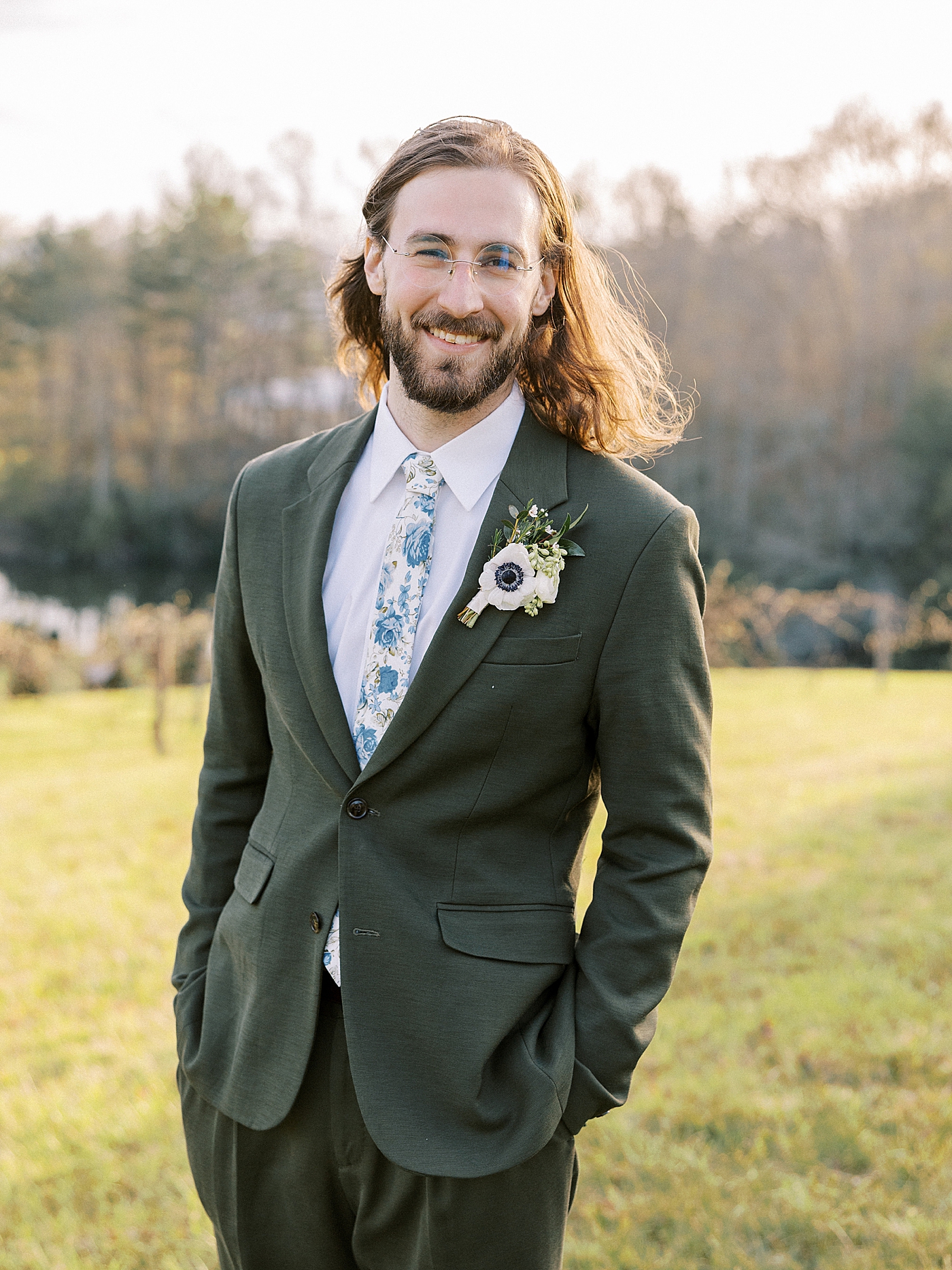 Groom in a suit smiling after his North Carolina Wedding | Photo by Diane Sotero Photography
