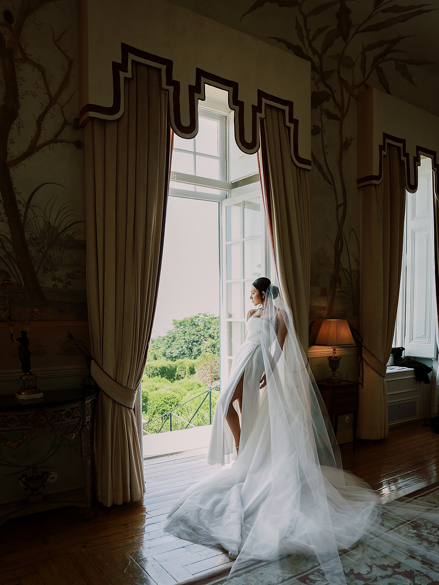 Bride standing by a window | Image by Diane Sotero Photography
