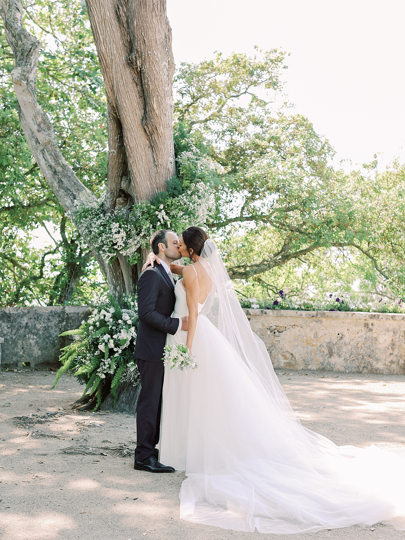 Bride and grooms first kiss | Image by Diane Sotero Photography