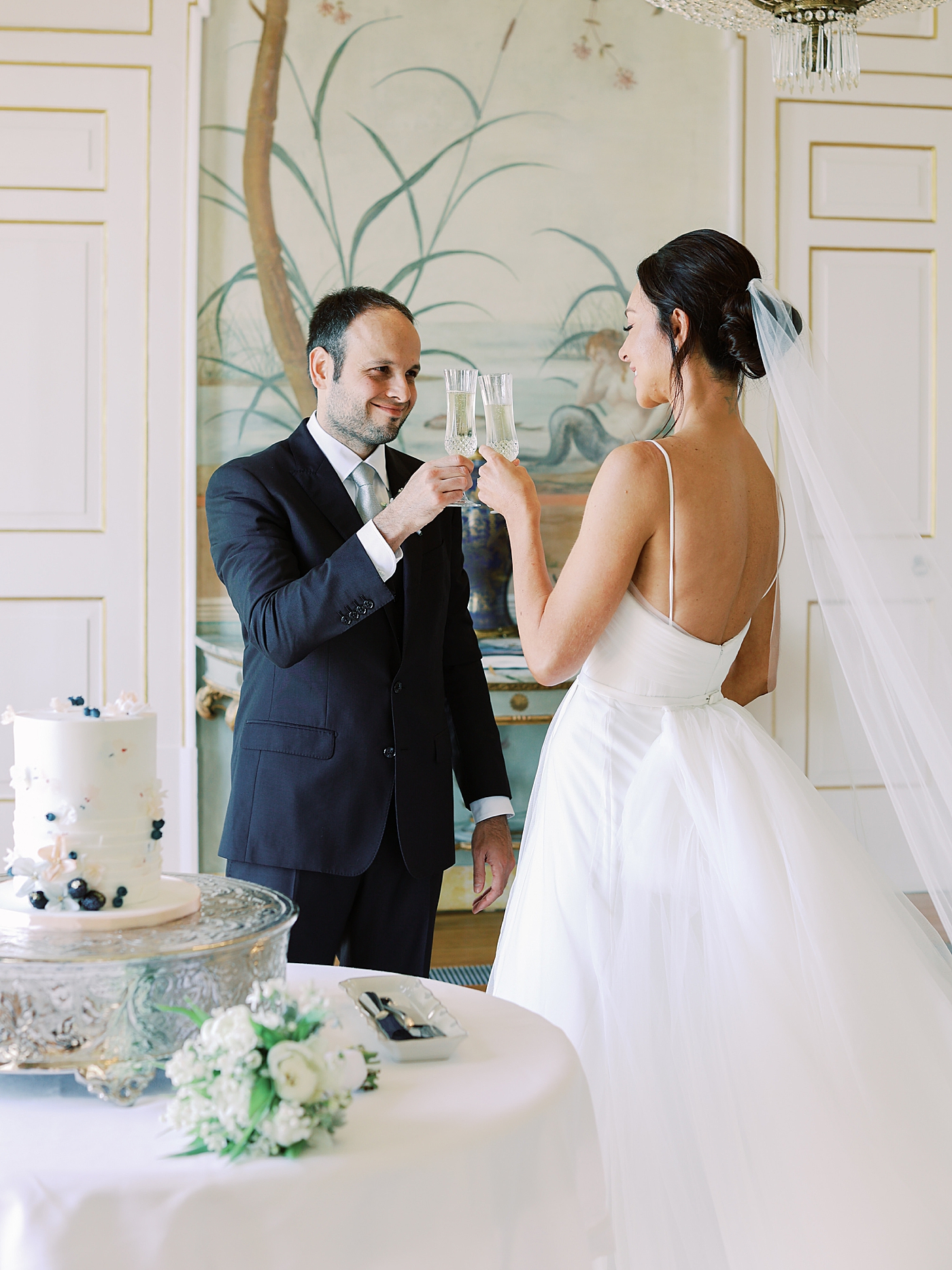 Bride and groom toasting after their Palácio de Seteais Elopement | Image by Diane Sotero Photography