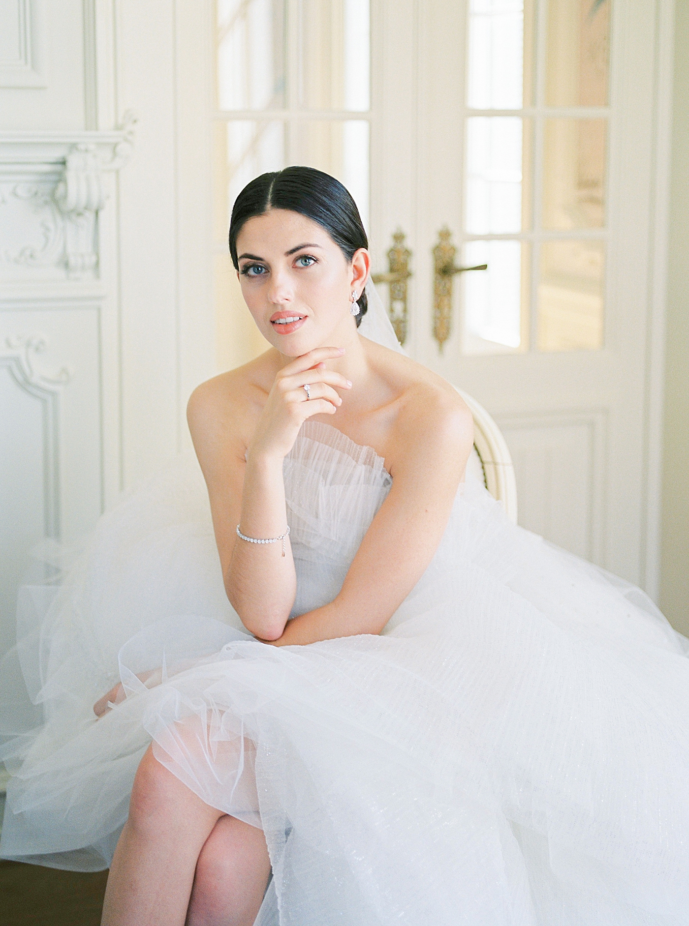 Bridal portraits of bride in couture gown in her getting ready room | Image by Diane Sotero 